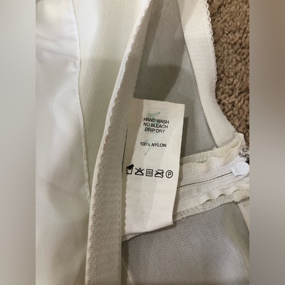 David’s Bridal Spaghetti Strap Layered Wedding Dress with Crinoline Underskirt - Picture 14 of 16